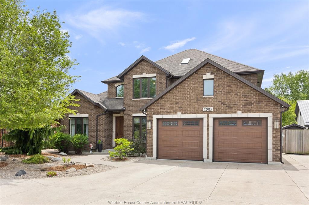 MLS# 26011998: 13013 RIVERSIDE Drive, Tecumseh, Canada