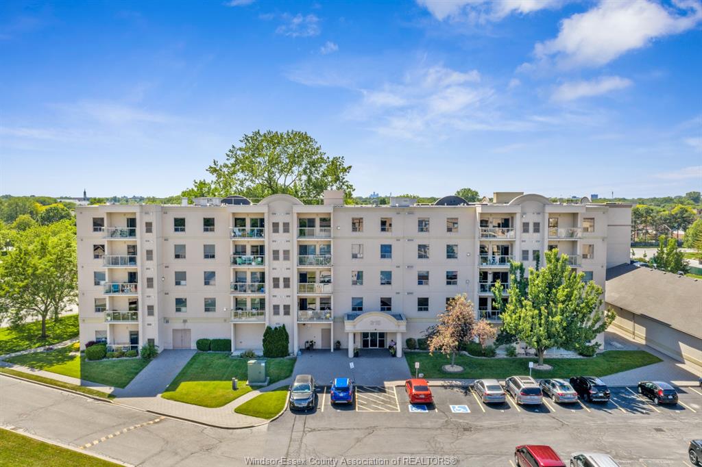 MLS# 26013286: 315 VILLAGE GROVE Drive Unit# 505, Tecumseh, Canada