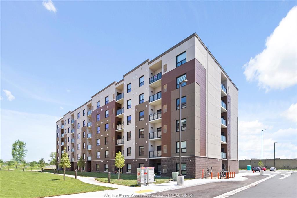MLS# 26013794: 728 BROWNSTONE Drive Unit# 201, Tecumseh, Canada