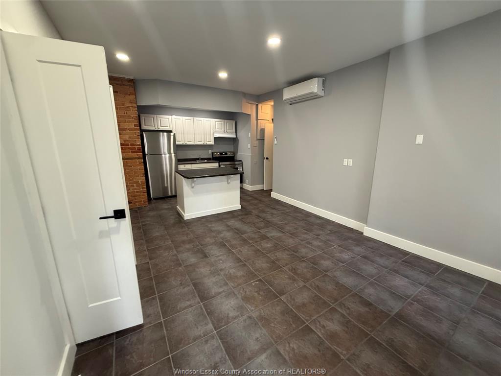 MLS# 26015263: 405 PELISSIER  Unit# A, Windsor, Canada