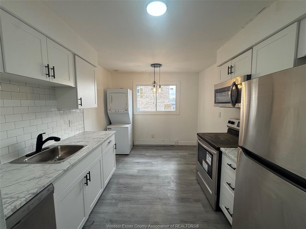 MLS# 26017951: 3150 PETER Street Unit# 8, Windsor, Canada