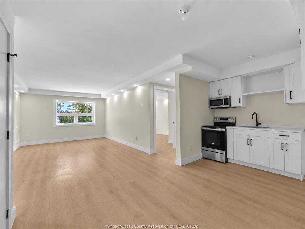 MLS# 26023035: 670 Cameron  Unit# 102, Windsor, Canada